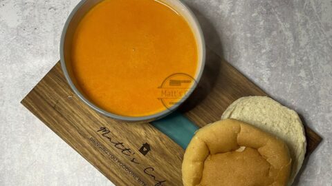 Red pepper and sweet potato soup recipe with bread roll